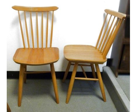 Set of four stickback pine-seated dining chairs in the Ercol taste, marked 'Czechoslovakia' to base (4) 
