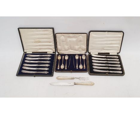 Cased set of six silver-handled knives, a cased set of six silver teaspoons&nbsp;with sugar tongs, a further cased set of six