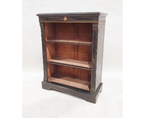 Victorian open bookcase, the rectangular top with moulded edge above a ceramic plaque of a head in profile, black painted bod