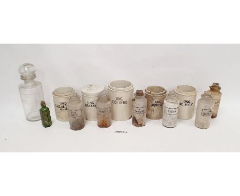 Assorted late 19th, early 20th century glass and ceramic apothecary jars.