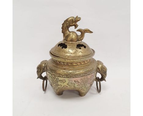 Chinese bronze censer and cover, the pierced low domed lid with dolphin finial and the body with elephant's mask and drop rin