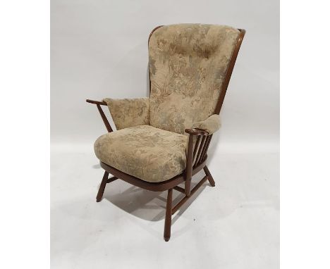 Modern Ercol armchair in pale cream ground upholstery 