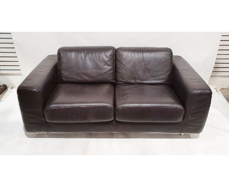 Modern brown leather two-seat sofa on chrome-coloured base 