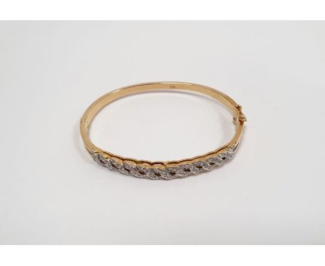 18ct yellow gold bangle set with tiny diamonds in open S-scroll band, 20g gross approx. 
