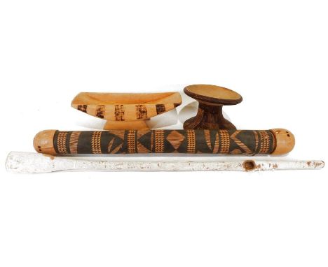 African carved quiver, a stool, an animal skin covered wooden pipe, and one further.