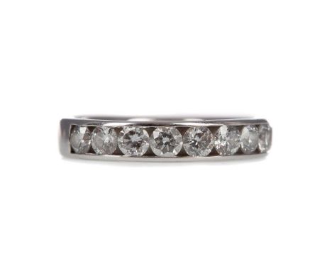 DIAMOND HALF ETERNITY RING,the channel set diamonds totalling approximately 1.00 carat, in eighteen carat white gold, size J 