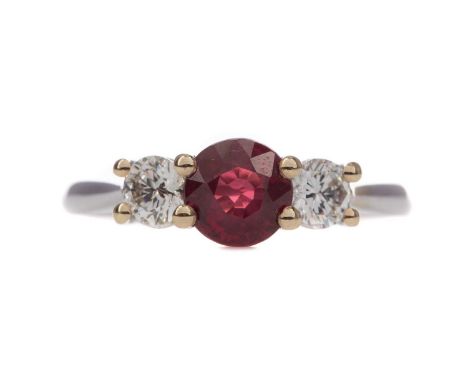 RUBY AND DIAMOND RING,the round ruby of approximately 0.95 carats flanked by two round brilliant cut diamonds totalling appro