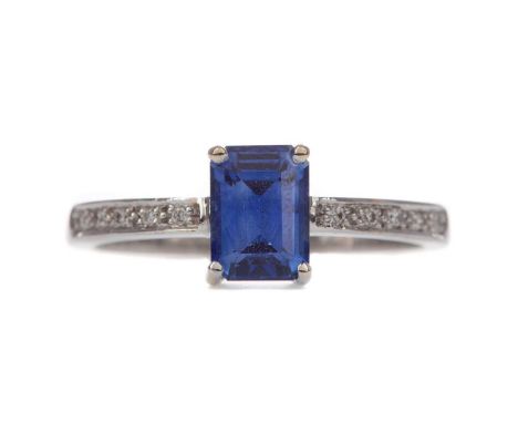 SAPPHIRE AND DIAMOND RING,the step cut sapphire of approximately 1.55 carats, on diamond shoulders, in eighteen carat white g