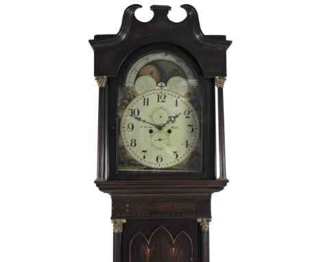 A mahogany and boxwood and chequer strung longcase clock, first quarter 19 th century, the broken scroll pediment above an ar