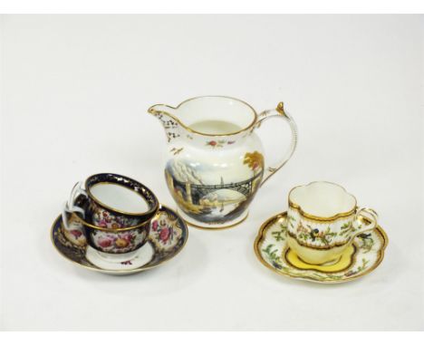 A group of Coalport porcelain, early 19th century onwards comprising two cobalt ground florally painted trios of coffee cup, 
