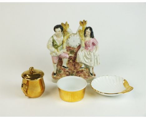 A Royal Worcester gold set of custard cups and cover, shell-form dishes and ramekins together with two pairs of Staffordshire