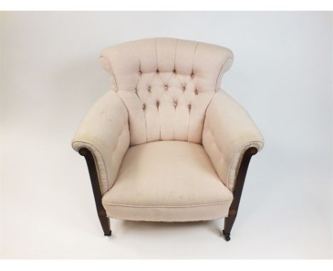 A Edwardian mahogany boxwood strung and inlaid tub chair, later upholstered in cream covers with button back and raised on sq