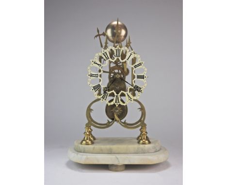 A brass skeleton clock with triple steeple open frame and single fusee movement striking on a bell with axe head hammer white