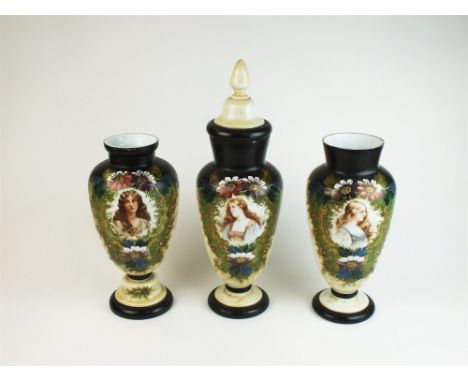 A garniture of three French or Bohemian opaline glass portrait vases late 19th century, transfer-printed with central panels 