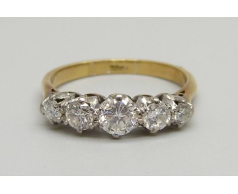 An 18ct gold, five stone diamond ring, 2.5g, L 