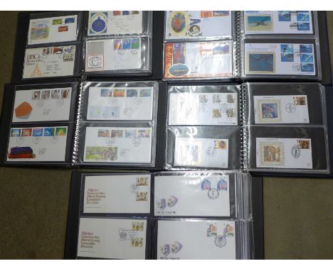 Five albums of first day covers 