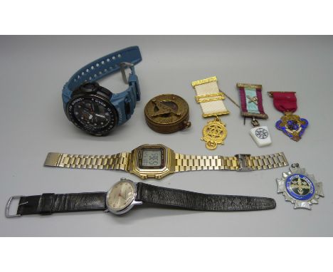 Three Masonic fobs including one silver, a Timex wristwatch, a compass, etc. 