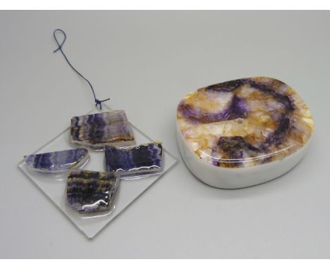 A Blue John and limestone paperweight and a Blue John and resin light catcher 
