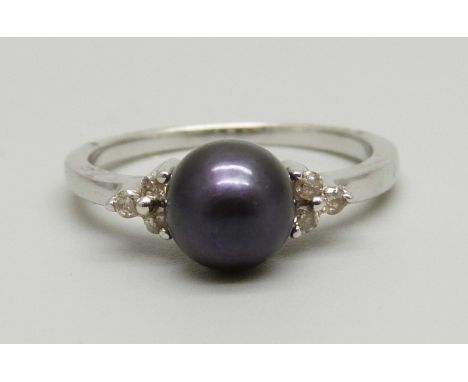 A 9ct white gold, pearl and diamond set ring, 2.4g,  N 