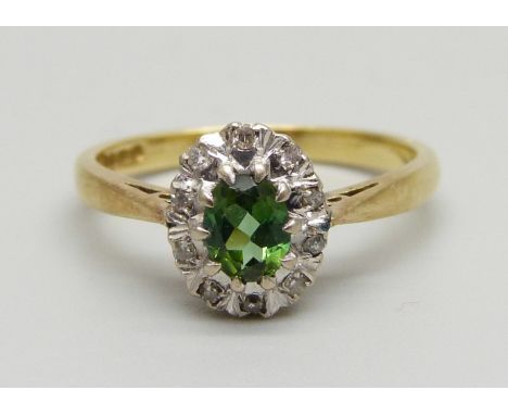 An 18ct gold, diamond and green stone cluster ring, 3.3g, M, (possibly chrome tourmaline) 