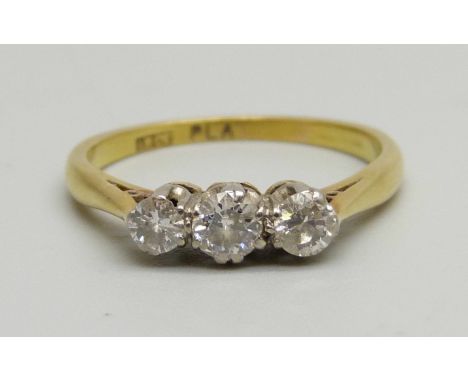 An 18ct gold and diamond set ring, 3g, P 