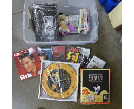 Elvis collectables; two Life Publications, Your Guide to Elvis, wall clock, singing and dancing Teddy, metal plaques, stamp f