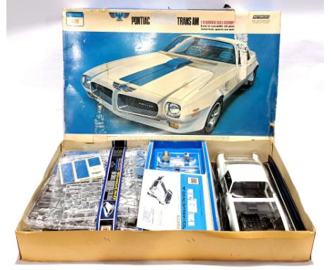 Otaki 1202 Pontiac Firebird Trans AM 1:12 scale unmade plastic model kit. Condition generally appears to be Good Plus, conten
