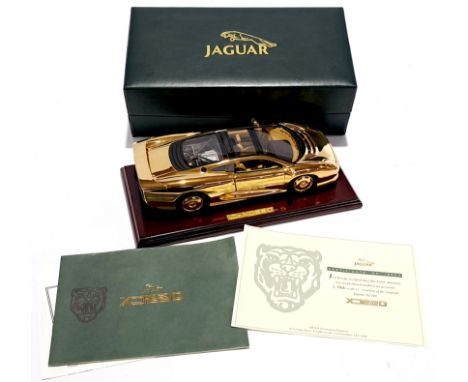 Gwilo, a boxed 1:18 scale 22ct Gold Plated Jaguar XJ220. Condition generally appears to be Good Plus to Excellent with some s