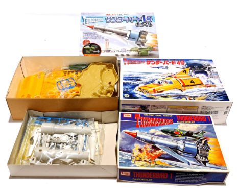 Aoshima, Imai &amp; DeAgostini Thunderbirds related unmade plastic model kits, to include Japanese kits. Condition generally 