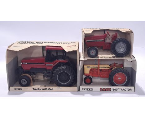 ERTL, a John Deere Tractor group to include #415, #693 and similar. Conditions generally appear Near Mint in generally Fair t