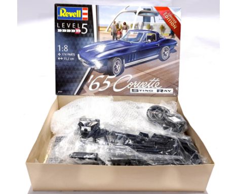 Revell 07434 '65 Corvette Stingray 1:8 scale unmade plastic model kit. Condition generally appears to be Good Plus, contents 