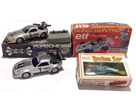 A mostly boxed radio controlled group, to include 1:16 scale Porsche 928 and others. Although unchecked for completeness (1 P