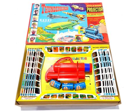 Chad Valley "Thunderbirds" - Give.a.Show Projector - plastic issue finished in blue, red with various colour slides. Conditio