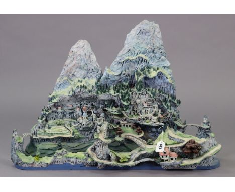A painted ceramic rural-scene display model, 31” wide x 22” high. 