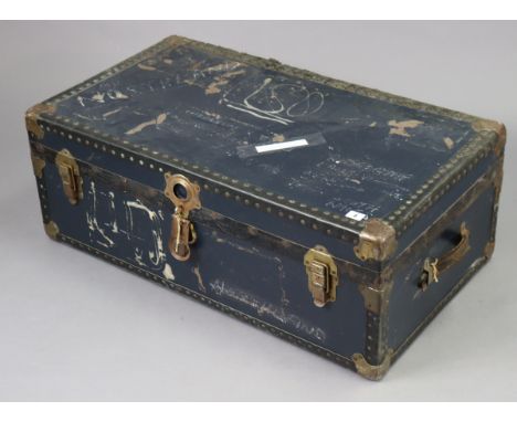 A blue fibre-covered travelling trunk having a hinged lift-lid 36” wide; together with an aluminium folding step ladder; &amp