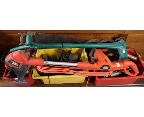 A Black &amp; Decker garden strimmer; together with various other tools and accessories.