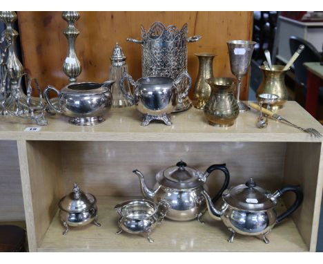 A silver plated three-piece tea service; a pair of silver plated candlesticks; &amp; various other items of platedware.