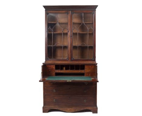 A GEORGE III MAHOGANY SECRETAIRE BOOKCASE, the upper part with a dentil moulded cornice above blind fretted frieze and two Go