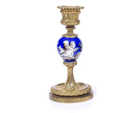 A LATE 19TH CENTURY FRENCH ORMOLU AND PORCELAIN MOUNTED CANDLESTICK, the baluster shaped knop painted with cherubs music maki