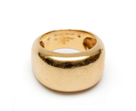 Cartier, 18 kt. gouden ring, breed model. De ring gesigneerd en genummerd en voorzien van een certificaat van Cartier [1] net