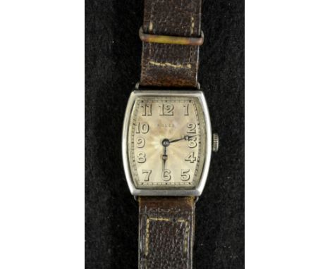 Rolex - an Art Deco tonneau silver cased wrist watch, guilloche silvered tonneau dial, Arabic numerals, minute track, fifteen