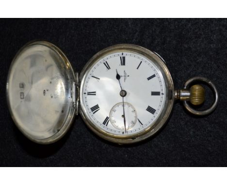 An Edwardian silver full hunter pocket watch, white dial, Roman numerals, minute track, subsidiary seconds, button wind movem