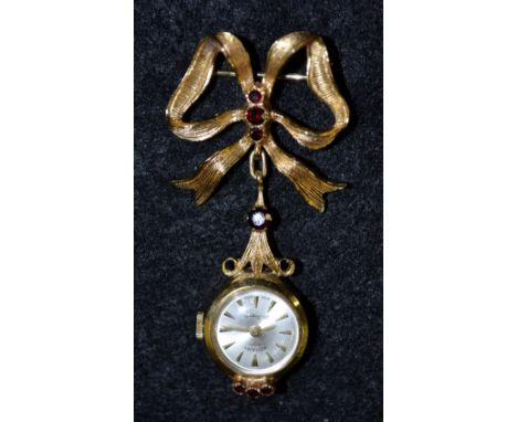 A 9ct gold garnet set Rotary nurse's fob watch, silvered dial, baton arrows, manual movement, 9ct gold case, suspended from a