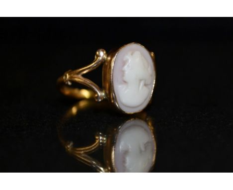 A rose gold cameo ring, oval portrait cameo, Maiden facing right, 9ct rose gold shank, stamped HR&S 9ct, size Q, 2.3g gross
