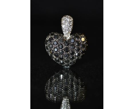 A Chopard diamond and coloured black diamond pendant, the heart-shaped pendant pavé-set with black diamonds, beneath a pavé w