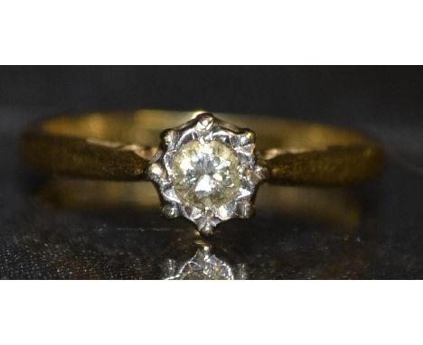 A diamond solitaire ring, round brilliant cut diamond, approx 0.10ct, illusion set shoulders, size K, 18ct gold shank, Birmin