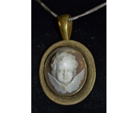A 19th century cameo pendant, oval panel carved with a Cherub, multi-layer herringbone yellow metal frame, hinged suspension 