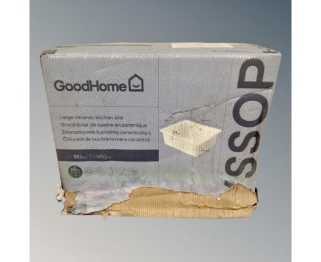 A boxed ceramic kitchen sink, 565mm across.