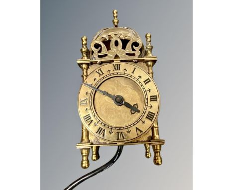 A Smiths miniature lantern clock, with electric Smiths movement, height 16.5 cm.