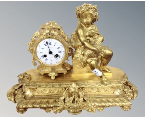 A 19th century French ornate figural ormolu mantel clock, retailed by A. Ambrosoni of Paris, height 33cm